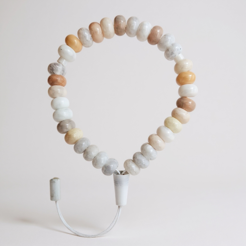 Gebetsarmband der Rondela-Serie (Creme-Achat) 8 x 5 mm